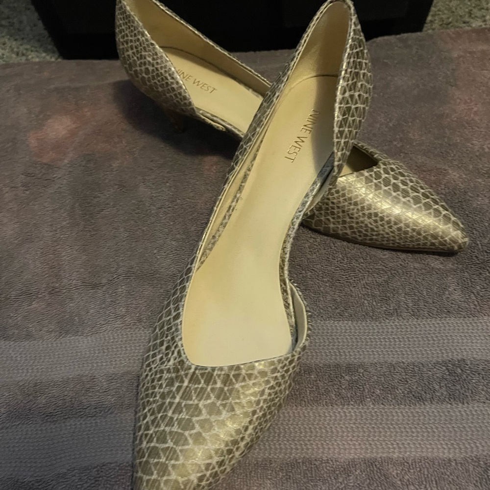 Beautiful Nine West heels. Never worn and now are too small. Woman size 11